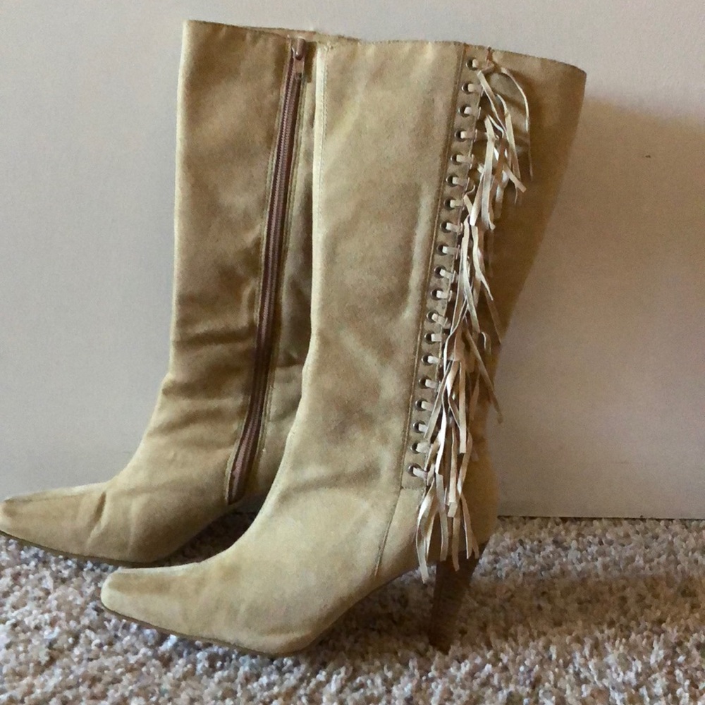 Western style tan boots with fringe